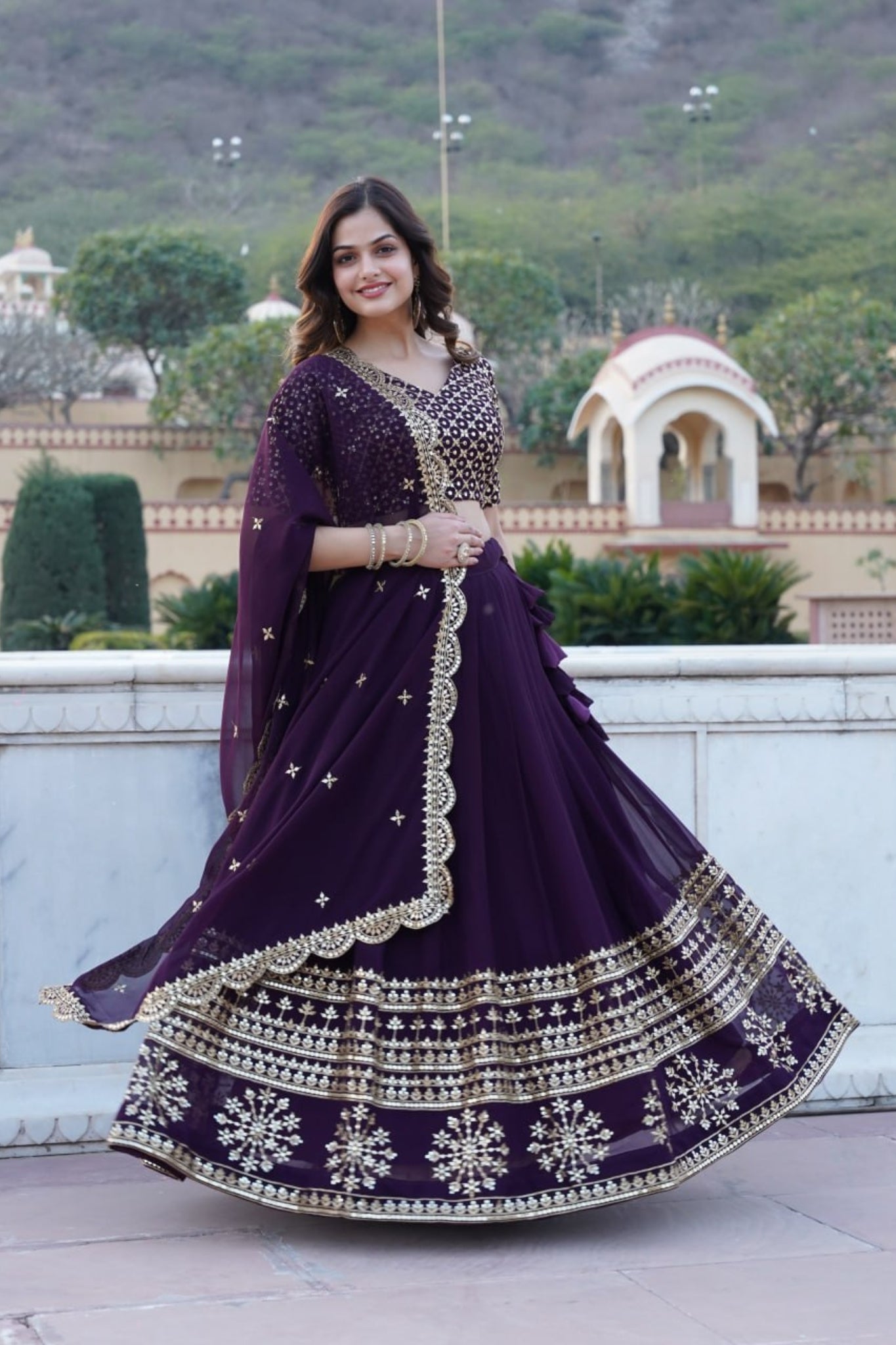 Georgette Flared Sequins And Embroidered Lehenga Choli